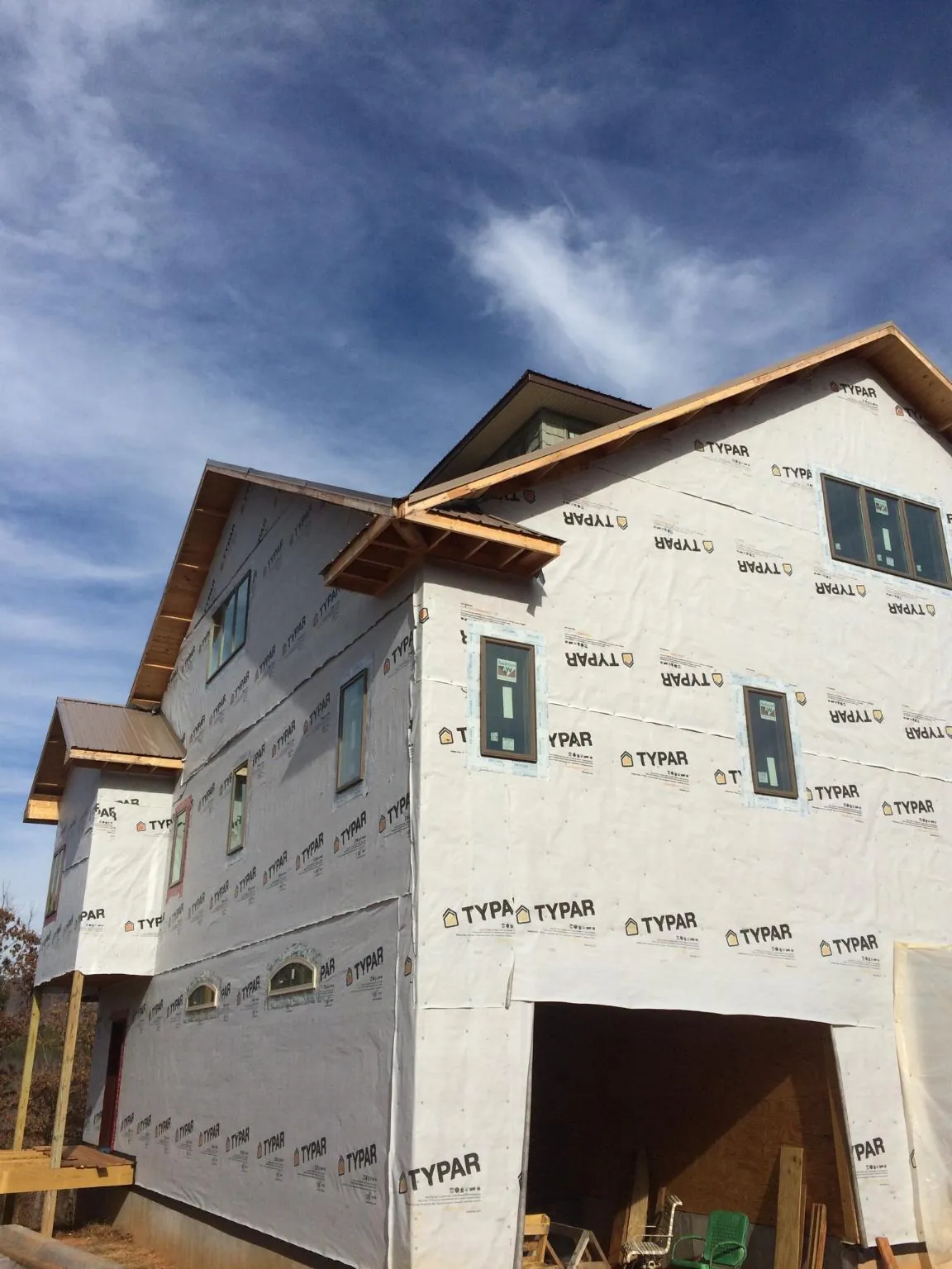 Stick built house wrapped in Typar with new roof framing and dormers in Sugar City